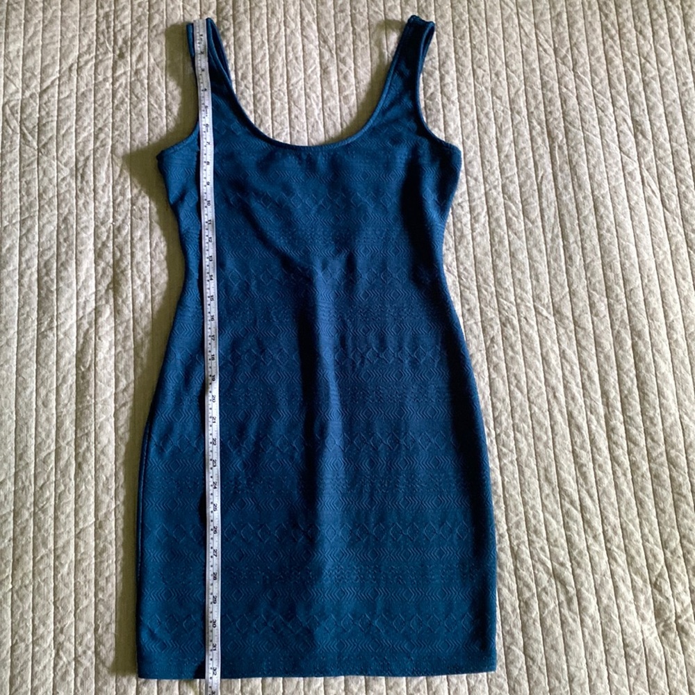 Bodycon Sleeveless Teal Blue mini dress.